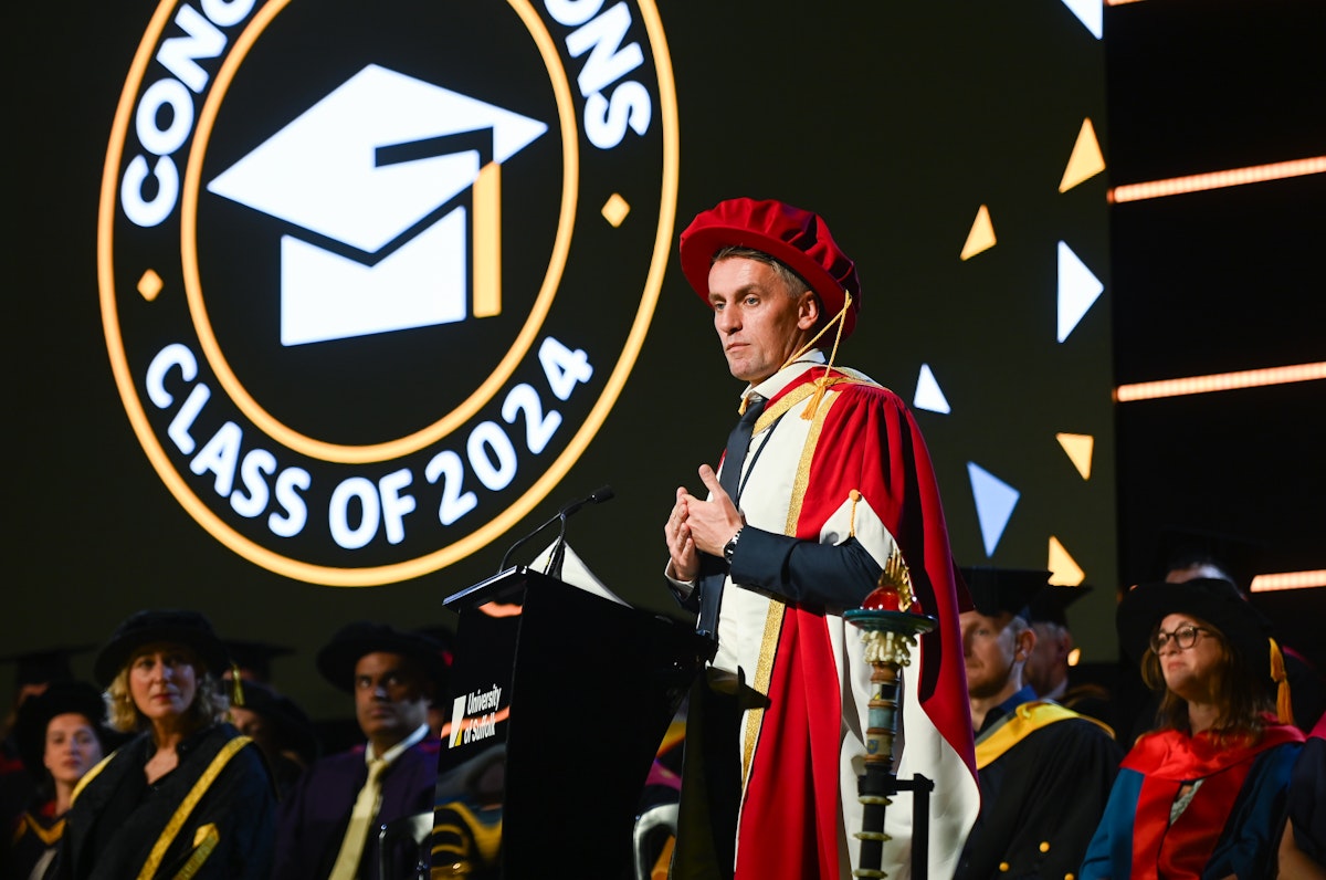 Kieran McKenna in his graduation robes at the University of Suffolk graduation ceremony